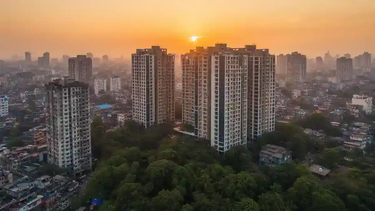 Bangladesh cityscape with apartment buildings and green trees